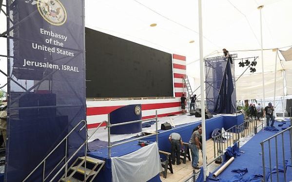 Workers prepare the stage for the opening of the new US Embassy in Jerusalem.